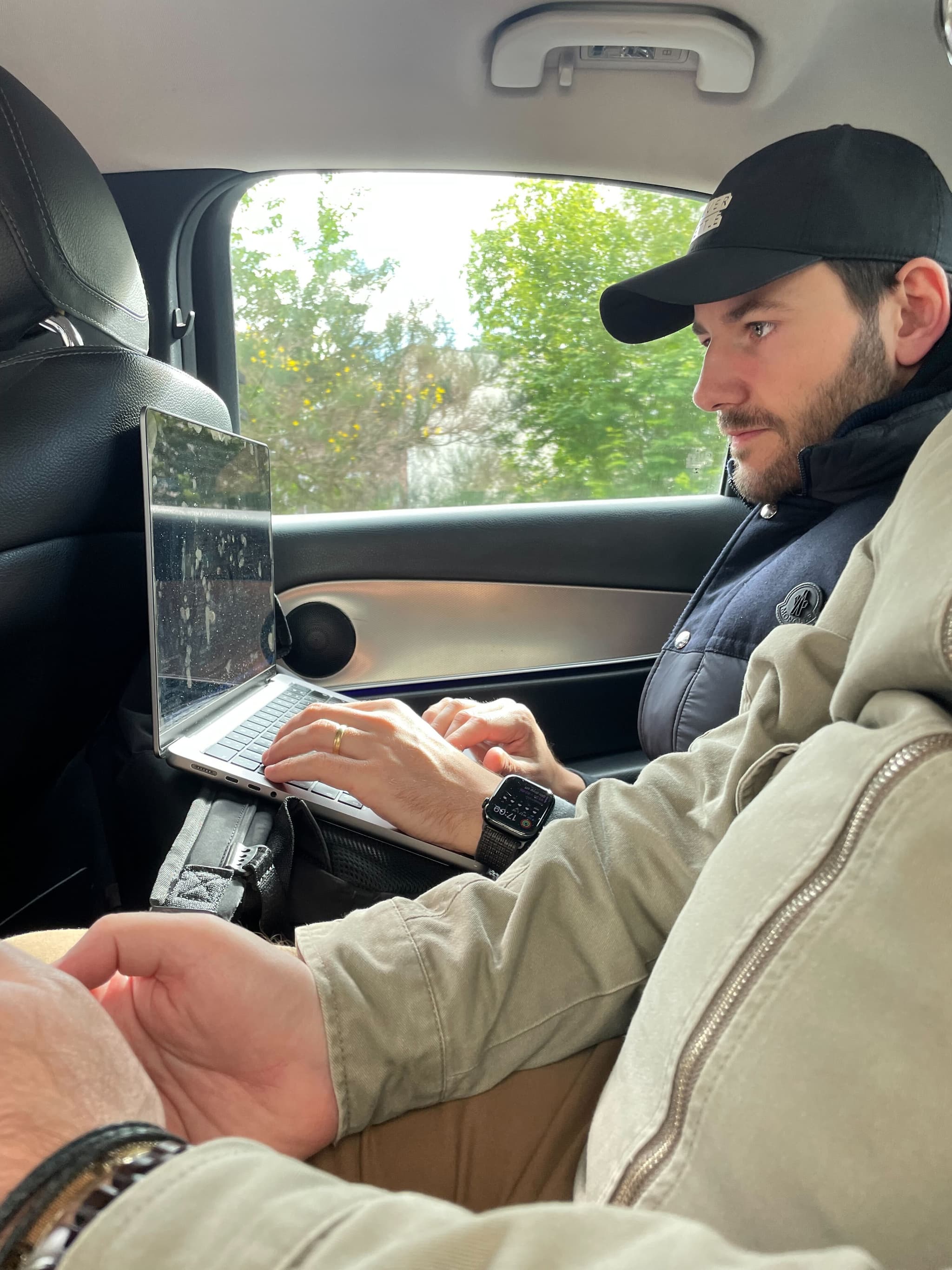 Cranking code in the back seat between city shoots