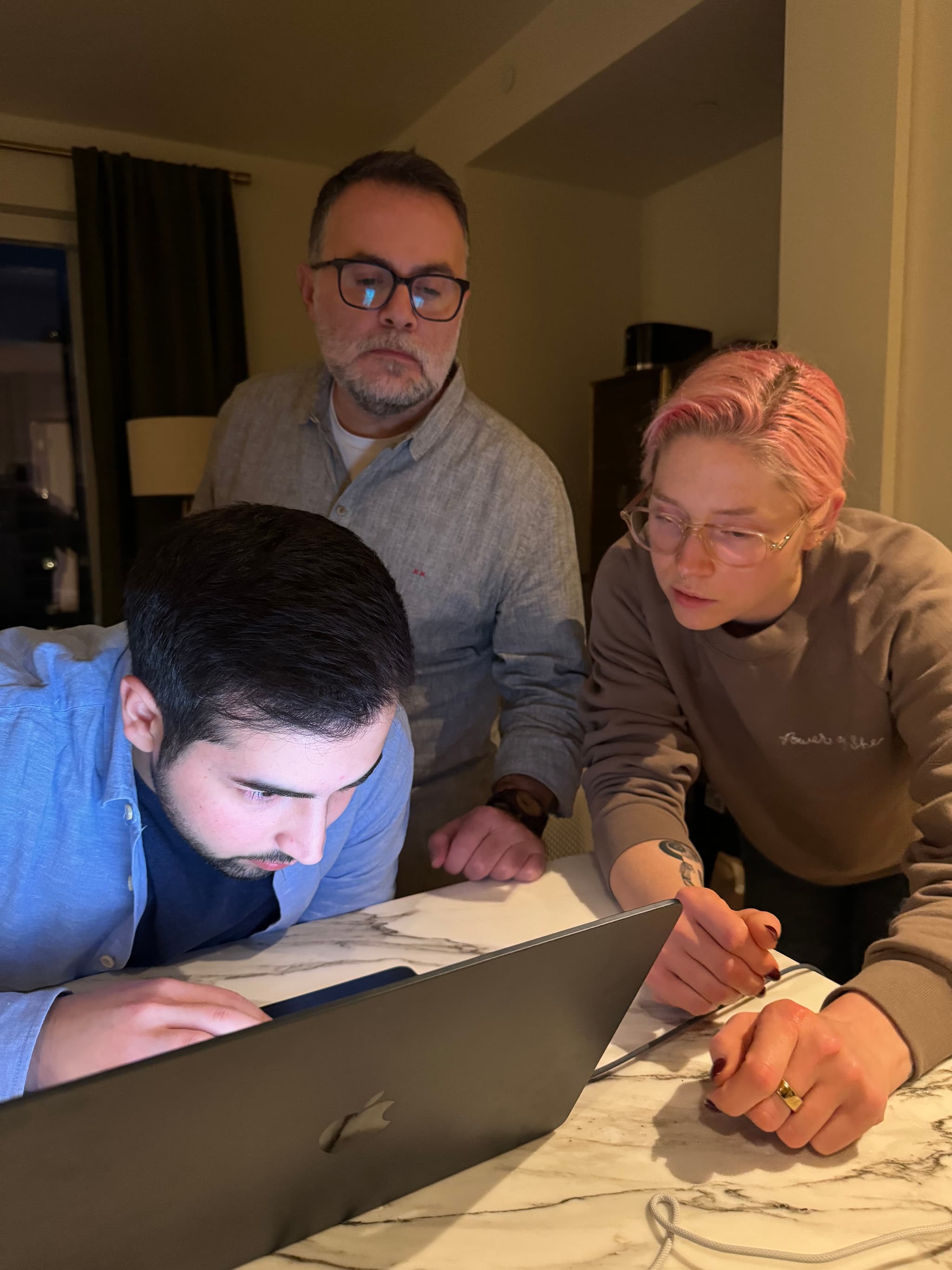 Late-night code review around the kitchen island